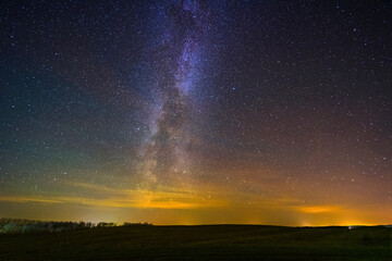 Night landscape with colorful Milky Way, autumn sky