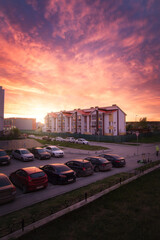 Beautiful sunset in the sky over the building of the suburbs. Yekaterinburg, Michurinsky district