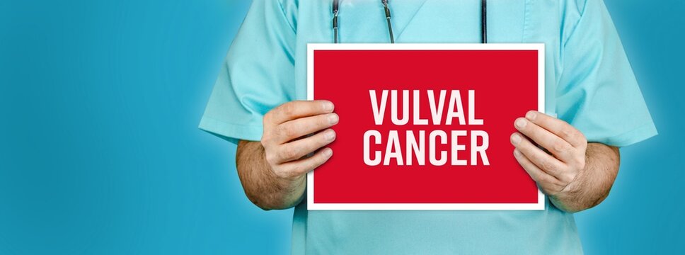 Vulval cancer. Doctor shows red sign with medical word on it. Blue background.