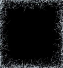 A frame of a frosty pattern  on a black background. A frame with an abstract ice structure allows you to apply or add a frost effect. Frost on the glass, freezing effect - obrazy, fototapety, plakaty