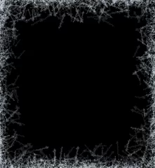 A frame of a frosty pattern  on a black background. A frame with an abstract ice structure allows you to apply or add a frost effect. Frost on the glass, freezing effect © OleJohny