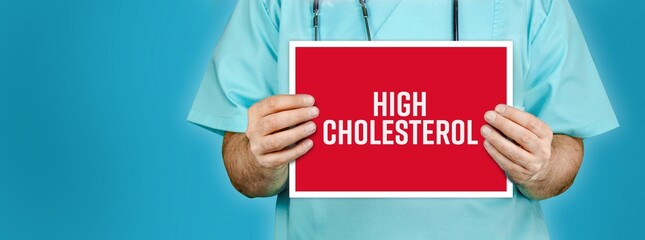 High cholesterol. Doctor shows red sign with medical word on it. Blue background.