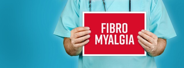 Fibromyalgia (fibromyalgia syndrome (FMS)). Doctor shows red sign with medical word on it. Blue background.