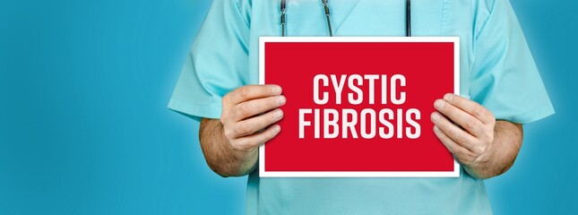 Cystic fibrosis. Doctor shows red sign with medical word on it. Blue background.