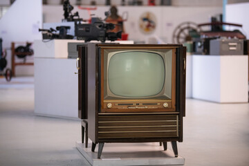 Vintage television. Old TV in museum. Retro technology.