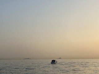 fishing boat at sunset