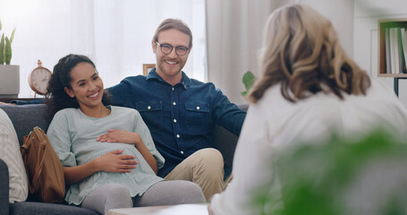 Pregnant, happy and couple in counseling with a psychologist consulting, listening and helping. Communication, pregnancy and healthy woman talking to a marriage therapist with partner for support - obrazy, fototapety, plakaty