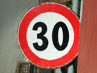 Road sign MAXIMUM SPEED 30 outdoors on sunny day © New Africa