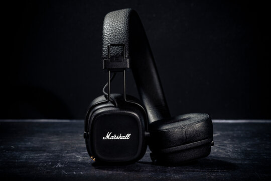 TALLINN, ESTONIA- November 01.2022: Marshall headphones on black background. Marshall Major IV wireless on-ear bluetooth headphones are modern sound gadget made by British company