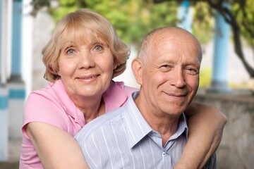 Obraz premium Senior happy couple hugging at home