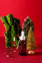 Skin Care Cosmetic Products in Bottle Christmas Tree Tree Bark Red Background Christmas Cosmetic Banner Winter Skin Care Products Festive Cosmetic Sale Concept Vertical