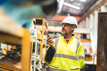 professional technician engineer working to control electrical power and safety service system,...