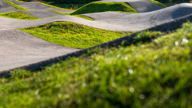 Outdoor bicycle asphalt pumptrack surrounded by nature in Polanka Wielka, Poland.