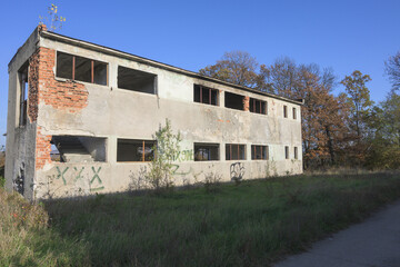 Fototapeta na wymiar Abandoned industrial building. Dilapidated building.;