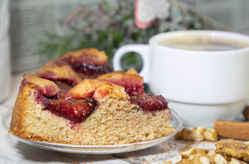 homemade rustic plum cake and a cup of coffee, food still-life 