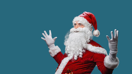 Happy Santa Claus screams from happiness. Amazing Christmas.