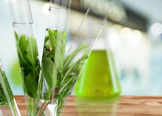 Green bio plants in test tubes