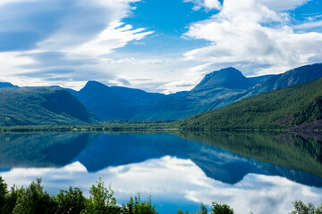 Fototapeta na wymiar Reflection on a beutiful lake in Norway