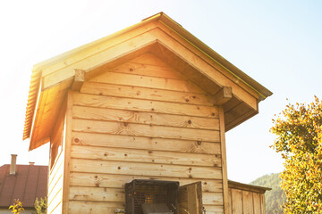 Hen coop in the garden.Sunny autumn day. © Munka