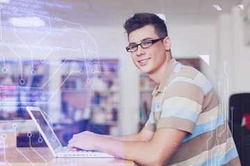 Young male programmer business person works on computer