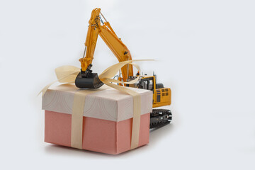 Gift box  with Excavator Crawler, Holiday celebration concept new year on white background