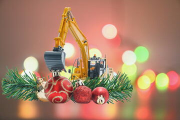 Christmas ornament and Excavator model ,  Holiday celebration concept new year