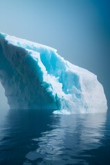Fototapeta na wymiar A massive iceberg and ice floes in the North Sea. 