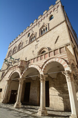 Fototapeta na wymiar Palazzo dei Priori is one of the best examples in Italy of a public palace from the communal age. It stands in the central Piazza IV Novembre in Perugia. 