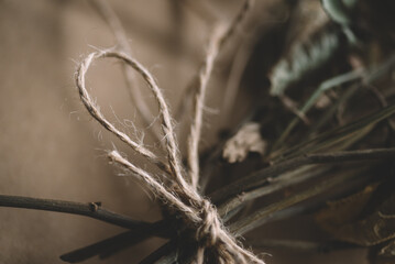 Soft fabric and dried flowers, Flowers on a bed, Rustic ribbon, Photo of dried flowers, Flower tied with vintage rope