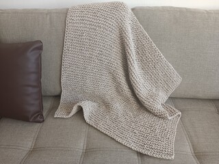 Knit afghan on the sofa