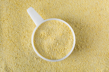 Yellow garri, top view of nigerian garri, fried cassava, garri for eba, nigerian food	