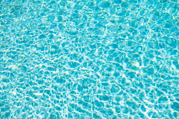 blue color background of ocean water with ripples in summer