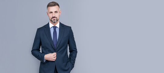 confident businessman man in businesslike suit, boss. Man face portrait, banner with copy space.