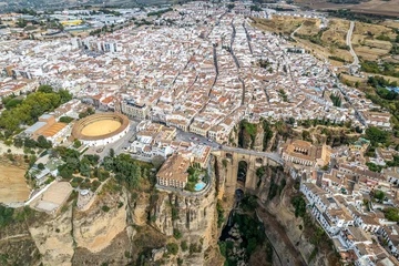 Photo sur Plexiglas Ronda Pont Neuf The drone aerial panoramic view of Ronda, Spain. Ronda is a town in the Spanish province of Málaga.Ronda is known for its cliff-side location.