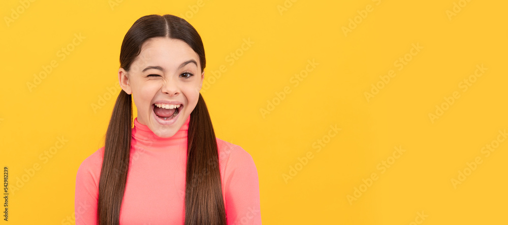 Poster winking child with long hair on yellow background, emotions. child face, horizontal poster, teenager