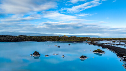 aerial view of blue lagoon in iceland with blue water hot springs