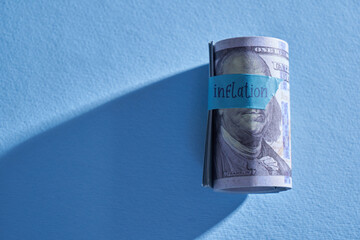 united state currency crisis conceptroll of money and single word inflation