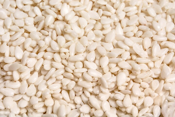  White sesame seeds background. Organic background.