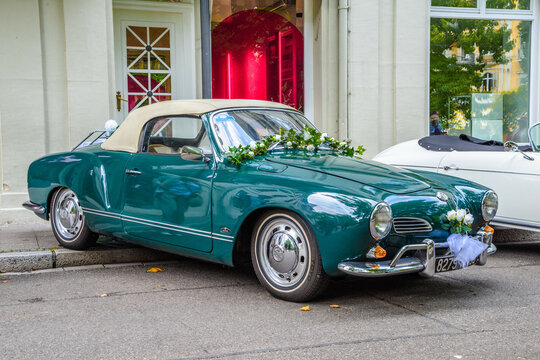 BADEN BADEN, GERMANY - JULY 2019: green emerald VW VOLKSWAGEN KARMANN-GHIA TYPE 14 CONVERTIBLE CABRIO 1955 1974, oldtimer meeting in Kurpark