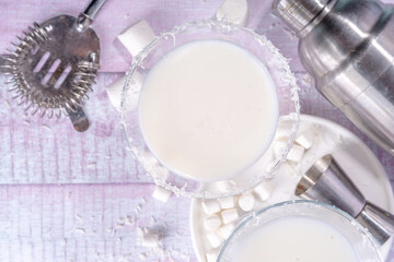 Cottontail Martini, sweet cute white martini alcohol cocktail, with marshmallow, marshmallow flakes