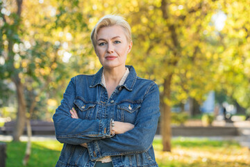 Portrait of an adult woman in a denim jacket