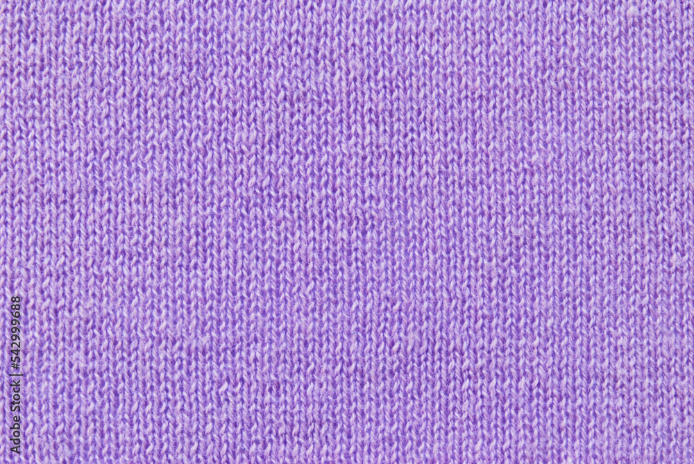 Wall mural Soft purple color knit fabric pattern close up as background