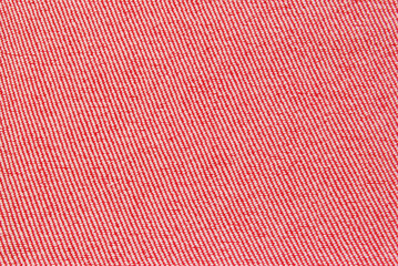 Red cotton fabric pattern close up as background