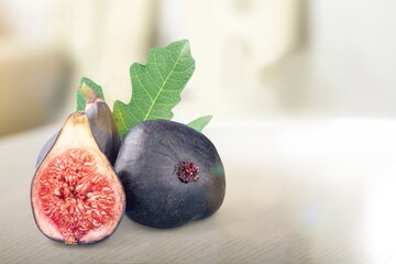 Fresh tasty ripe figs fruits on desk