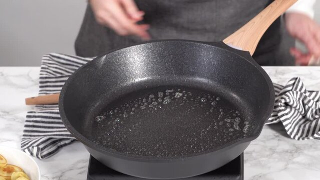 Step by step. Frying mini pancake cereal in a nonstick frying pan.