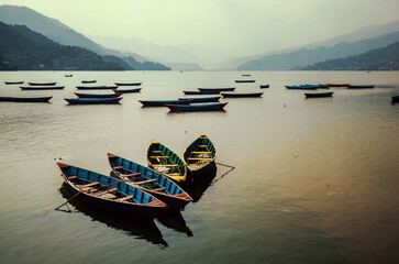 Blue boats on Lake Phewa Pokhara Nepal 