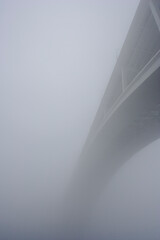 Arrabida bridge in the mist