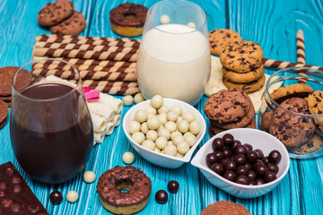 Chocolate milk with heap of sweets