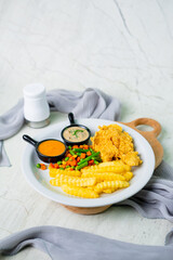 Beef steak served with two variant sauces, potato and vegetables. white background. brazilian typical food. variety angles