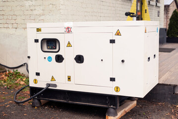 emergency generator for uninterruptible power supply, diesel plant in an iron case with an electrical power management switchboard. - obrazy, fototapety, plakaty